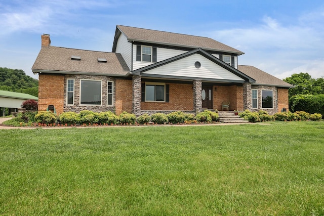 1361 Madison Creek Rd, Goodlettsville, TN 37072 - view of front of property with a chimney, covered porch, and a front yard