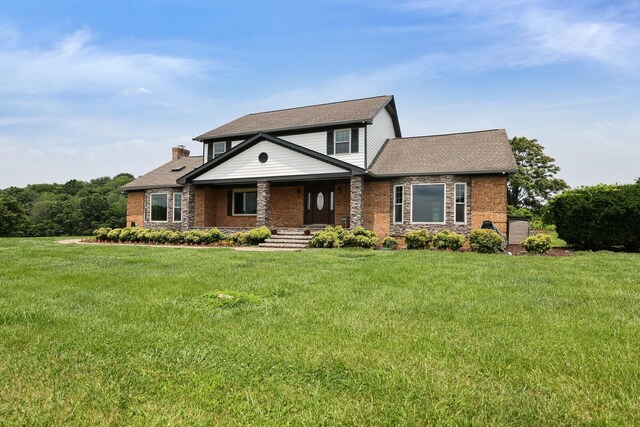 1361 Madison Creek Rd, Goodlettsville, TN 37072 - view of front of house featuring a porch, a chimney, a front yard, roof with shingles, and stone siding