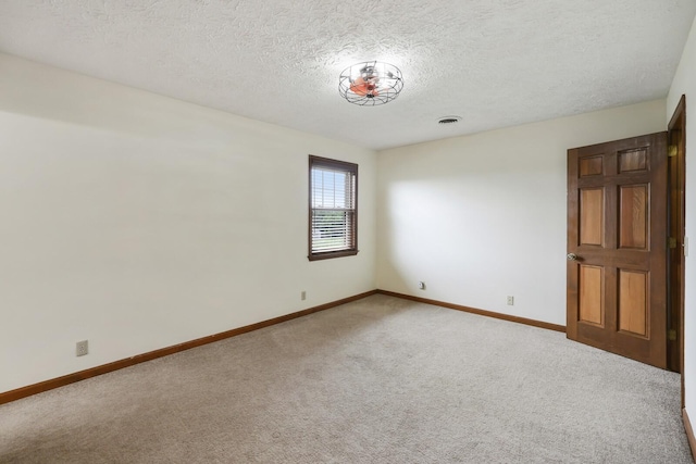 1361 Madison Creek Rd, Goodlettsville, TN 37072 - empty room with carpet and a textured ceiling