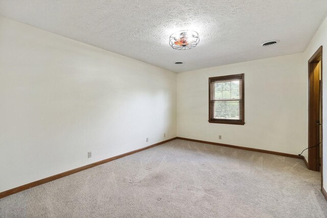 1361 Madison Creek Rd, Goodlettsville, TN 37072 - unfurnished bedroom featuring light colored carpet and a textured ceiling
