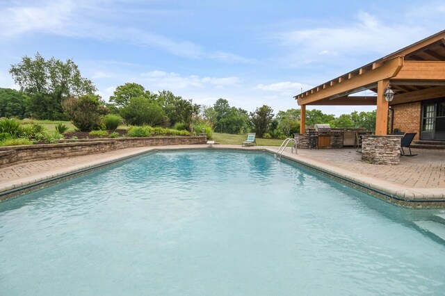 1361 Madison Creek Rd, Goodlettsville, TN 37072 - outdoor pool featuring exterior kitchen and a patio area
