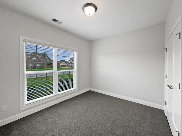 1117 Bandini Ct, Lascassas, TN 37085 - unfurnished room featuring dark carpet and baseboards
