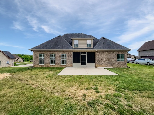 1117 Bandini Ct, Lascassas, TN 37085 - rear view of house with a patio area, brick siding, a lawn, and a shingled roof