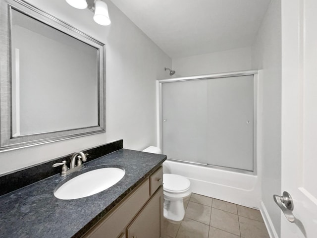 1117 Bandini Ct, Lascassas, TN 37085 - full bathroom with toilet, tile patterned floors, vanity, enclosed tub / shower combo, and baseboards