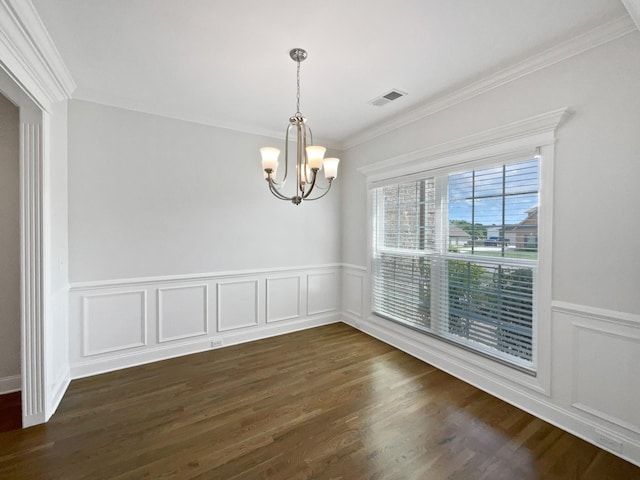 1117 Bandini Ct, Lascassas, TN 37085 - unfurnished dining area with a chandelier, ornamental molding, a wainscoted wall, dark wood-type flooring, and a decorative wall