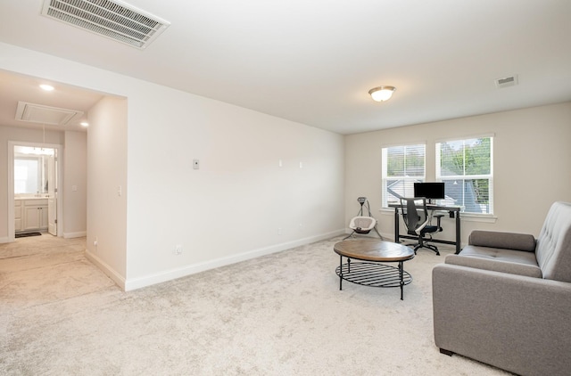 1063 Holland Ridge Way, Lebanon, TN 37090 - living area featuring attic access, light carpet, a desk, and baseboards