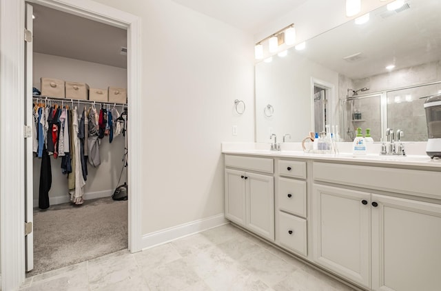 1063 Holland Ridge Way, Lebanon, TN 37090 - full bath featuring a shower stall, double vanity, a spacious closet, and baseboards