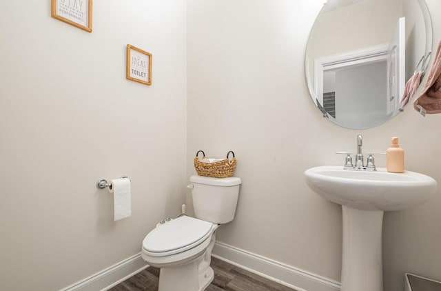 1063 Holland Ridge Way, Lebanon, TN 37090 - bathroom featuring wood finished floors, baseboards, and toilet