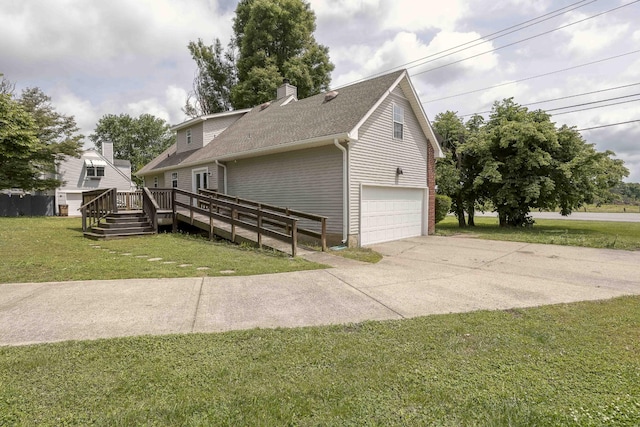 view of property exterior featuring a deck, a yard, a chimney, a garage, and driveway