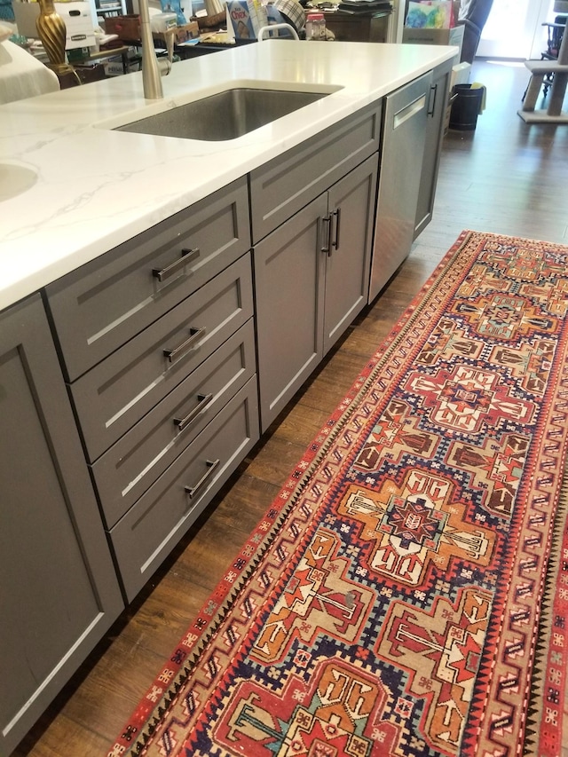 501 Wright Branch Cv, Hermitage, TN 37076 - kitchen with gray cabinetry, dark wood-type flooring, dishwasher, and a sink