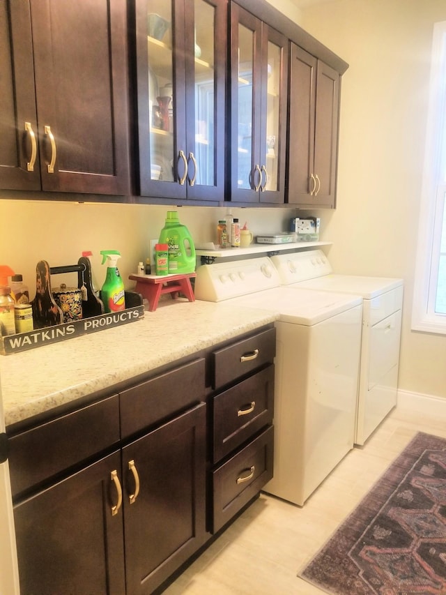 501 Wright Branch Cv, Hermitage, TN 37076 - laundry room featuring washer and clothes dryer and cabinet space