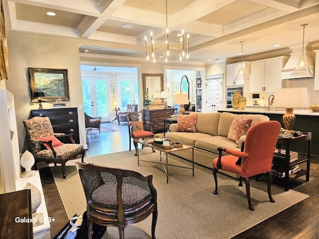 501 Wright Branch Cv, Hermitage, TN 37076 - living room with dark wood-style floors, beam ceiling, ornamental molding, coffered ceiling, and a chandelier
