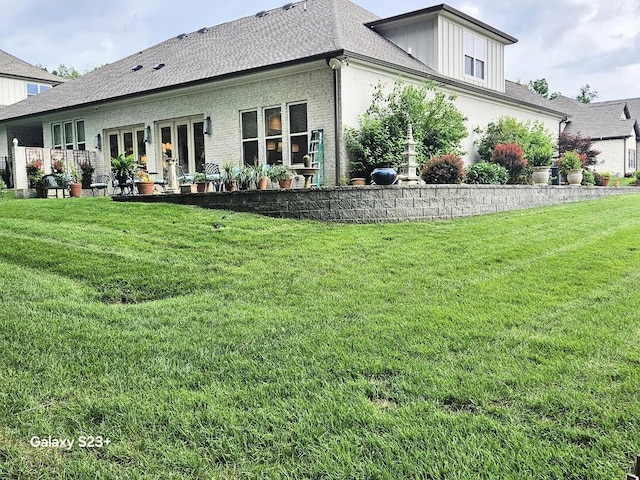 501 Wright Branch Cv, Hermitage, TN 37076 - rear view of property featuring french doors, a lawn, and brick siding