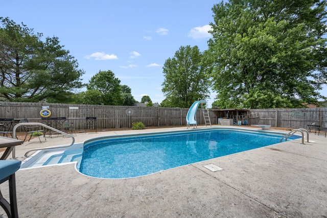 104 Pierce Pl, Unionville, TN 37180 - view of swimming pool with a water slide, a patio, and a fenced backyard