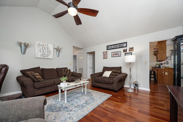 104 Pierce Pl, Unionville, TN 37180 - living room featuring ceiling fan, dark wood-style flooring, baseboards, and high vaulted ceiling