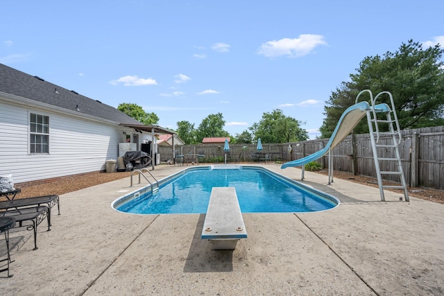 104 Pierce Pl, Unionville, TN 37180 - view of swimming pool featuring a water slide, a patio, a diving board, and a fenced backyard