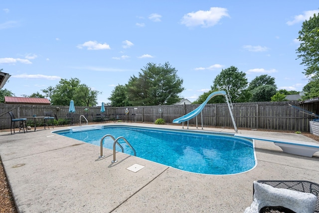 104 Pierce Pl, Unionville, TN 37180 - view of swimming pool featuring a patio area, a fenced backyard, a water slide, and a diving board