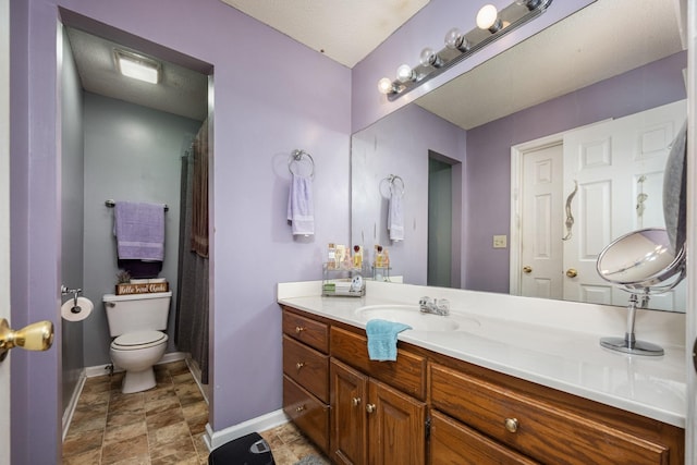 104 Pierce Pl, Unionville, TN 37180 - full bathroom with toilet, vanity, baseboards, and stone finish floors