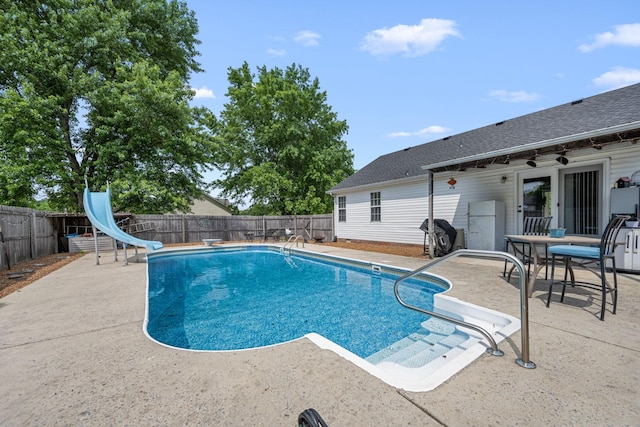 104 Pierce Pl, Unionville, TN 37180 - view of swimming pool with a water slide, a fenced backyard, and a patio area