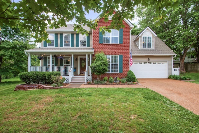 view of front facade featuring driveway, a porch, a garage, and a shingled roof