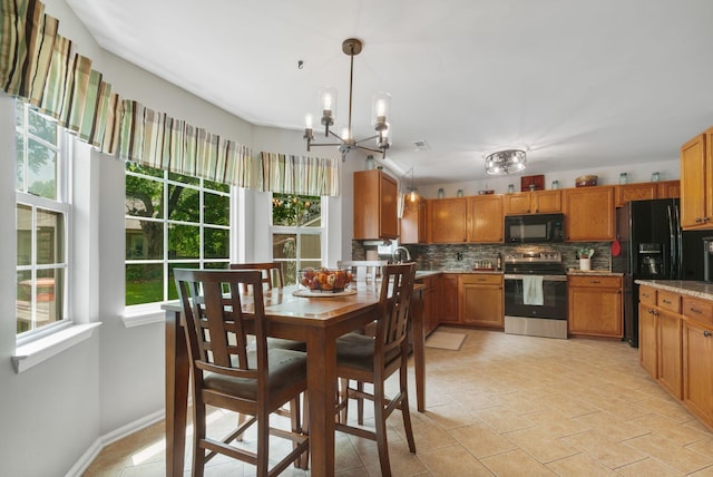 dining room featuring a chandelier