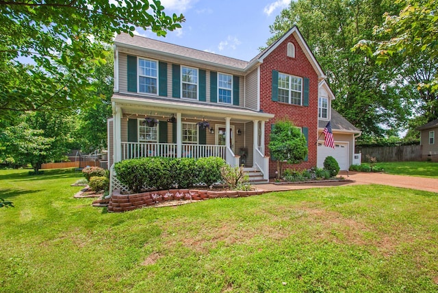 view of front of property with a porch, driveway, a garage, and brick siding