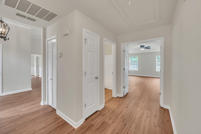 4725 Cape Hope Pass, Hermitage, TN 37076 - hall featuring light wood-type flooring, baseboards, and attic access