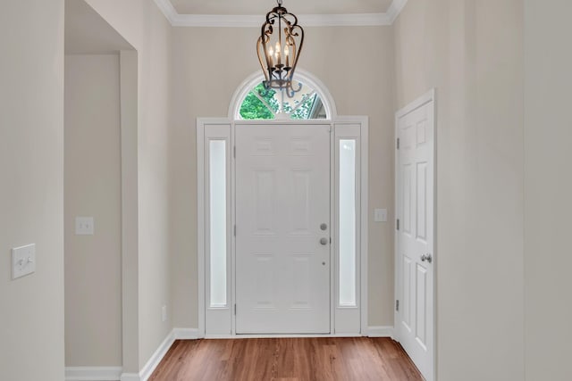 4725 Cape Hope Pass, Hermitage, TN 37076 - entrance foyer featuring a chandelier, wood finished floors, baseboards, and crown molding