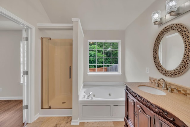 4725 Cape Hope Pass, Hermitage, TN 37076 - bathroom featuring a shower stall, vanity, and a tub with jets