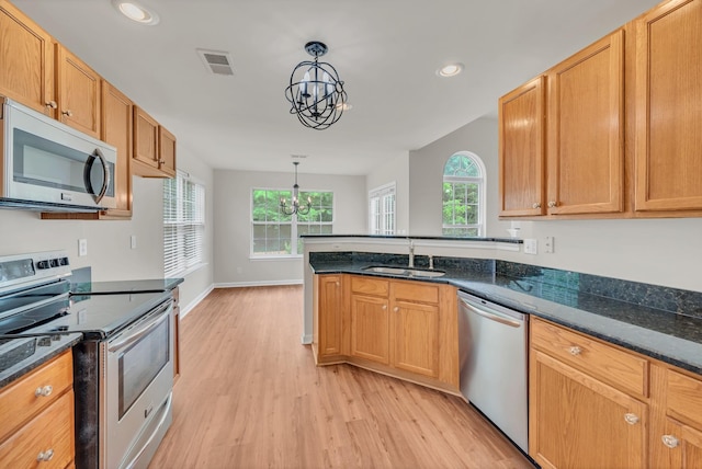 4725 Cape Hope Pass, Hermitage, TN 37076 - kitchen with appliances with stainless steel finishes, a chandelier, a sink, light wood finished floors, and recessed lighting