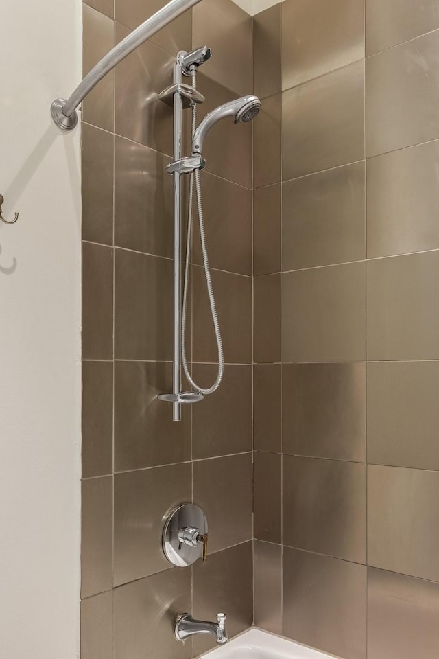 full bathroom with shower / bath combination