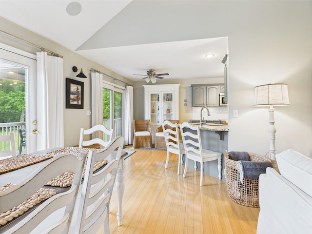 378 Roy Harris Rd, Kuttawa, KY 42055 - dining area with ceiling fan, vaulted ceiling, and light wood-type flooring