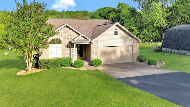 378 Roy Harris Rd, Kuttawa, KY 42055 - view of front of home featuring brick siding, concrete driveway, a front lawn, a garage, and roof with shingles