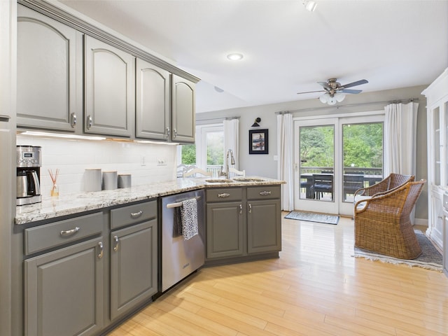 378 Roy Harris Rd, Kuttawa, KY 42055 - kitchen with stainless steel dishwasher, gray cabinetry, a ceiling fan, plenty of natural light, and recessed lighting