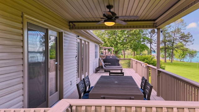 378 Roy Harris Rd, Kuttawa, KY 42055 - wooden deck with a ceiling fan, a grill, and a lawn