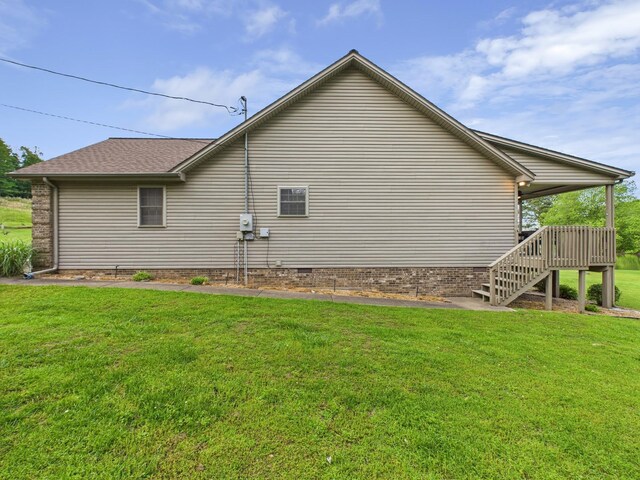 378 Roy Harris Rd, Kuttawa, KY 42055 - view of side of home with a lawn, crawl space, stairs, and roof with shingles
