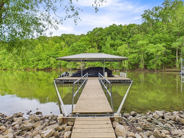 378 Roy Harris Rd, Kuttawa, KY 42055 - dock featuring a view of trees, a water view, and boat lift