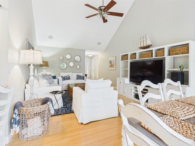 378 Roy Harris Rd, Kuttawa, KY 42055 - living room with ceiling fan, high vaulted ceiling, and light wood-style floors