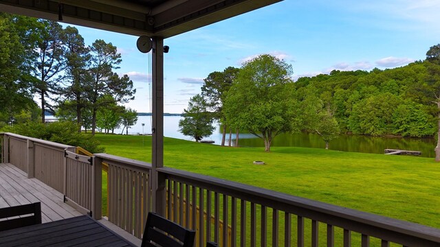 378 Roy Harris Rd, Kuttawa, KY 42055 - wooden terrace with a water view and a lawn