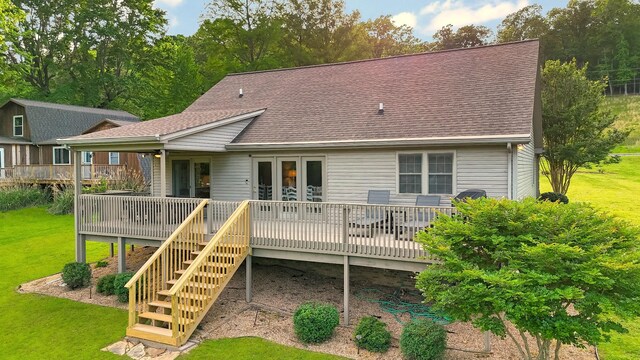378 Roy Harris Rd, Kuttawa, KY 42055 - rear view of house featuring a wooden deck, a shingled roof, and a yard