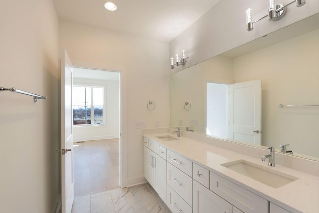 520 Proximity Cir, Nashville, TN 37207 - bathroom featuring double vanity, recessed lighting, baseboards, and marble finish floors