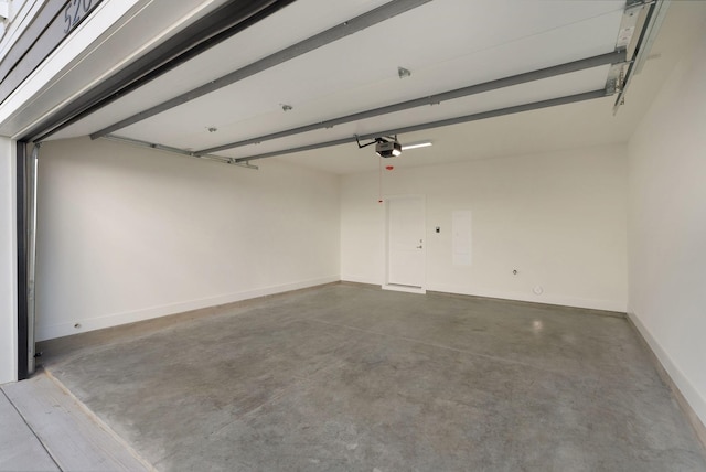 520 Proximity Cir, Nashville, TN 37207 - garage with a garage door opener and baseboards