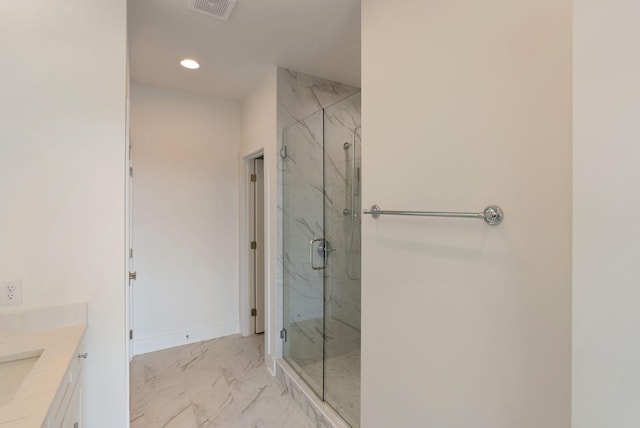 520 Proximity Cir, Nashville, TN 37207 - full bathroom with marble look tiles, a marble finish shower, vanity, recessed lighting, and baseboards