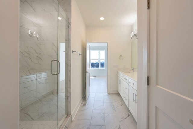 520 Proximity Cir, Nashville, TN 37207 - full bathroom with marble look tile flooring, a marble finish shower, vanity, baseboards, and recessed lighting