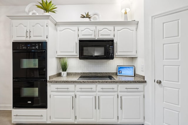 9455 Foothills Ct, Brentwood, TN 37027 - kitchen with black appliances, decorative backsplash, white cabinets, and dark stone countertops