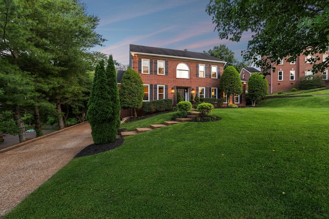 9455 Foothills Ct, Brentwood, TN 37027 - colonial inspired home with a yard and brick siding