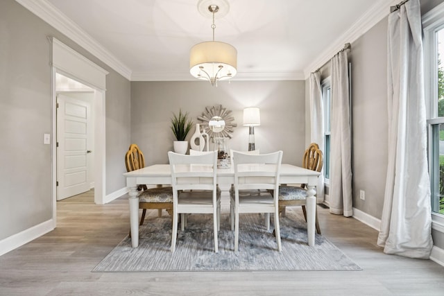 9455 Foothills Ct, Brentwood, TN 37027 - dining area with wood finished floors and crown molding
