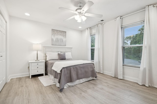 9455 Foothills Ct, Brentwood, TN 37027 - bedroom with light wood finished floors, recessed lighting, and a ceiling fan