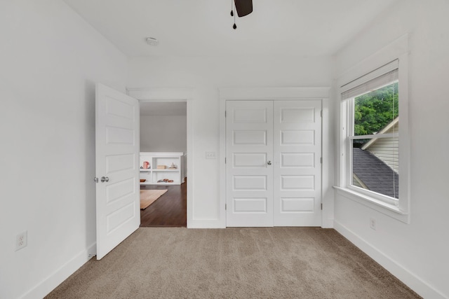 525B Stevenson St, Nashville, TN 37209 - unfurnished bedroom featuring carpet floors, a closet, baseboards, and ceiling fan
