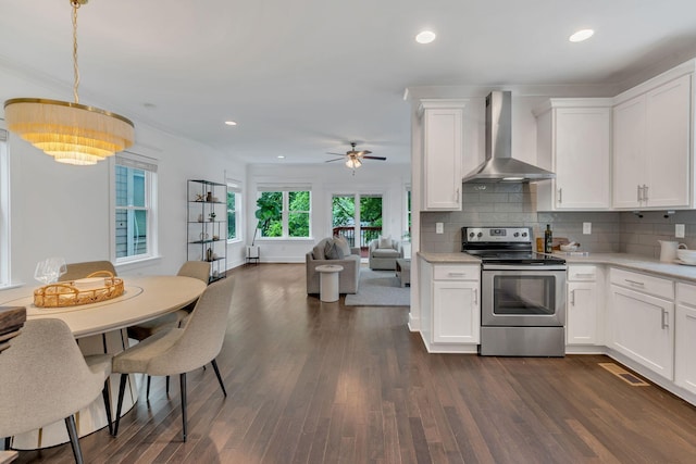525B Stevenson St, Nashville, TN 37209 - kitchen featuring wall chimney exhaust hood, stainless steel electric range oven, light countertops, a ceiling fan, and open floor plan